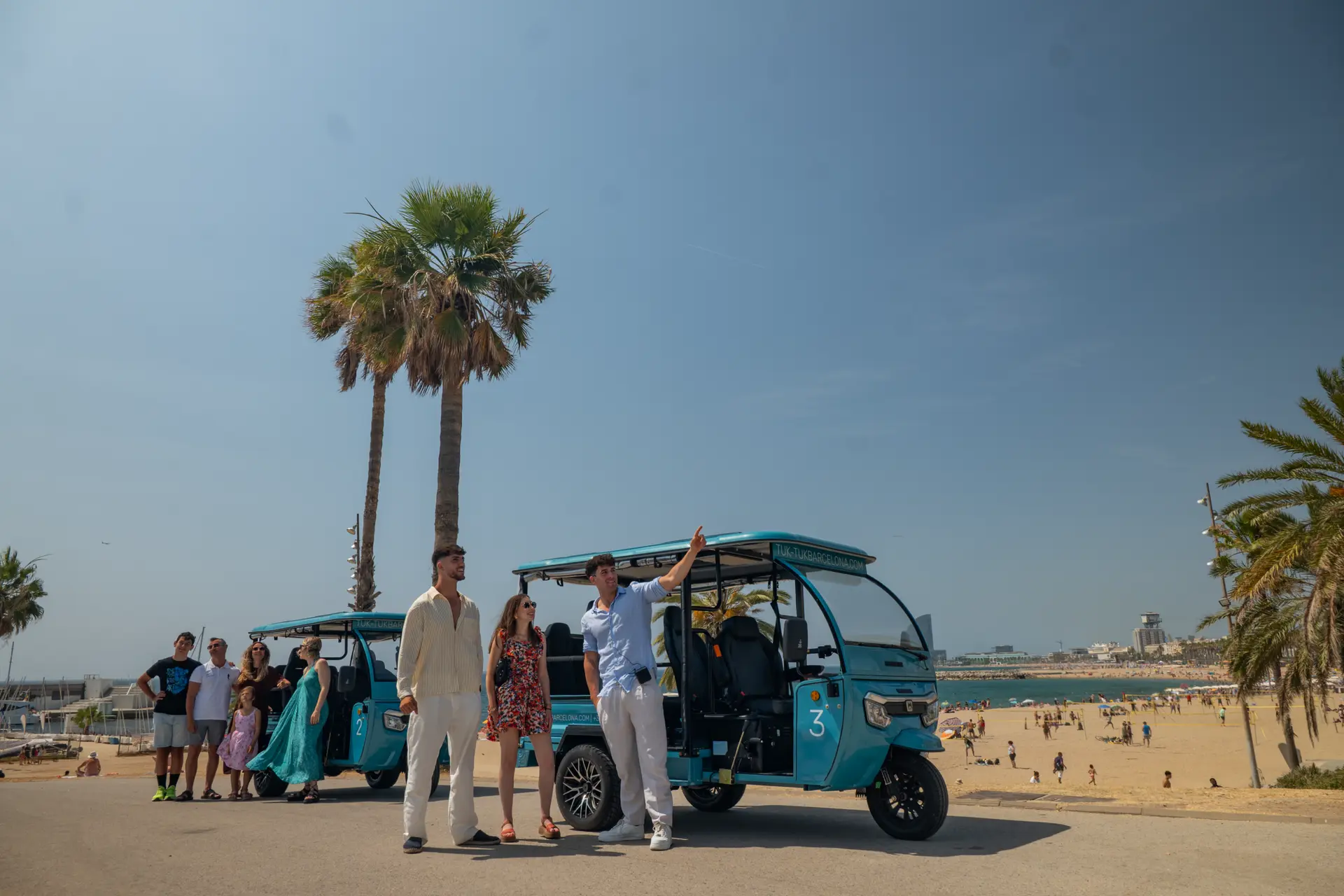 Electric Tuk Tuks travelling together in Barcelona